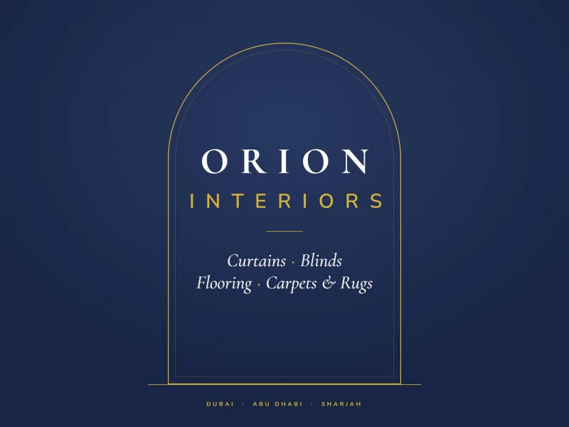 Orion Interiors brand: the ORION INTERIORS wordmark in white and gold inside a gold arch, over curtains, blinds, flooring, carpets and rugs, for Dubai, Abu Dhabi and Sharjah
